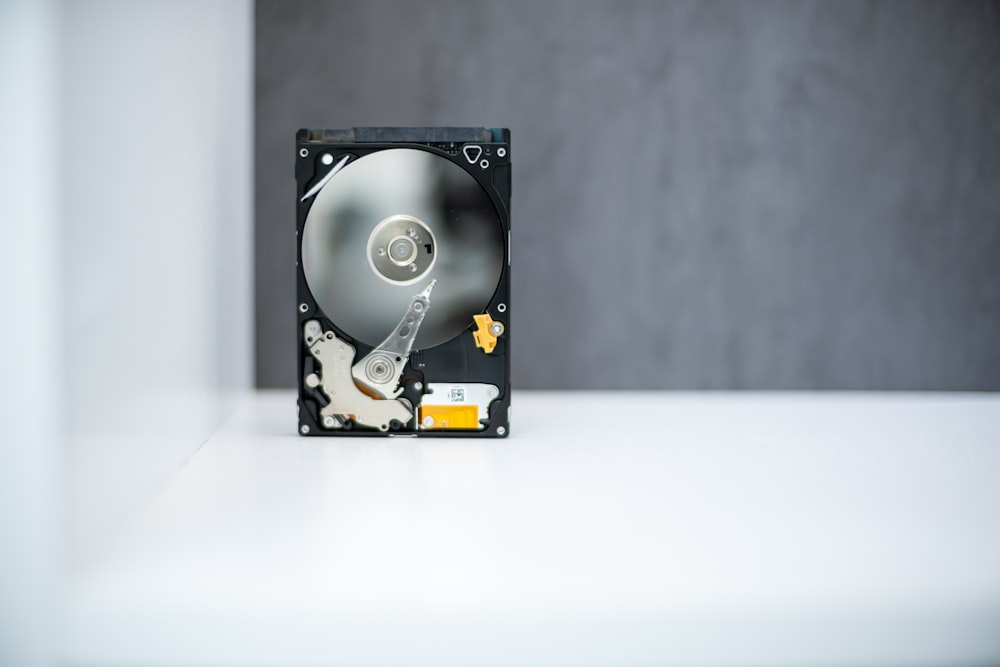 black and silver hard disk drive