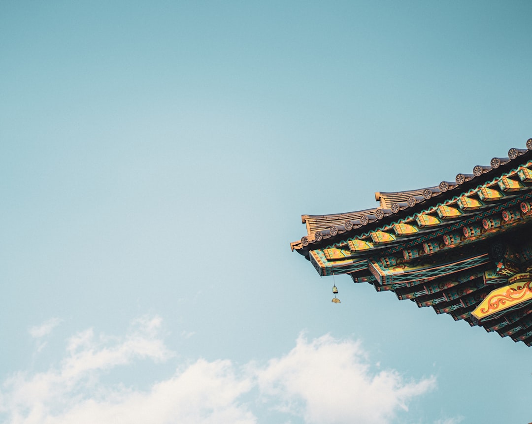 brown wooden roof under blue sky during daytime