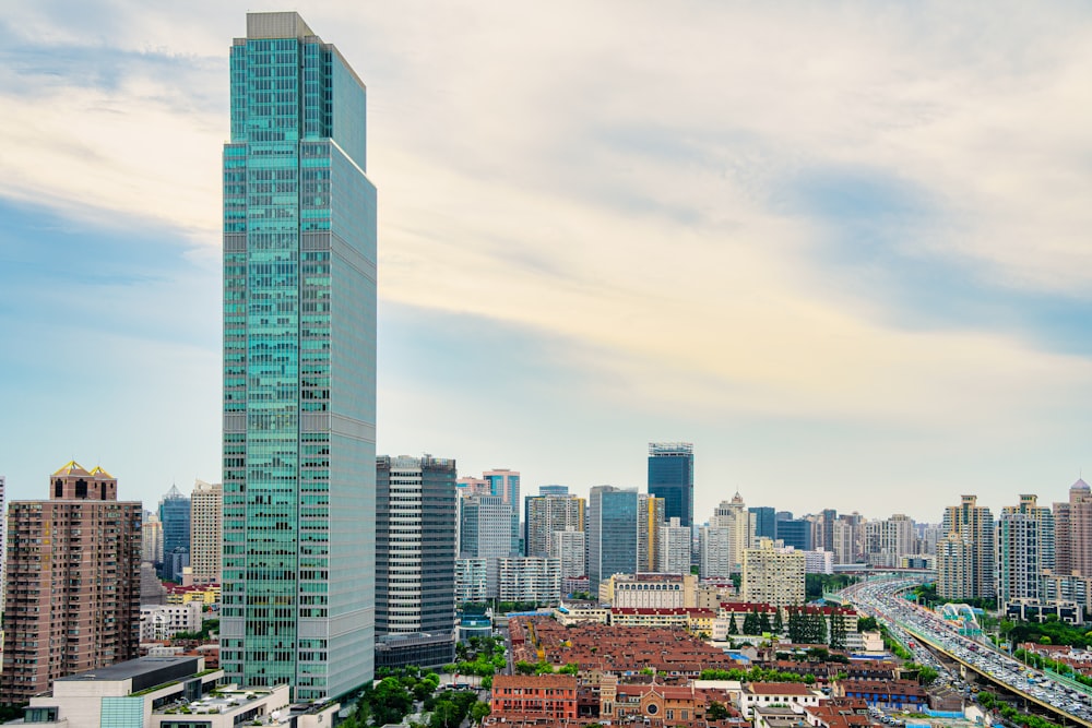 city skyline under blue sky during daytime