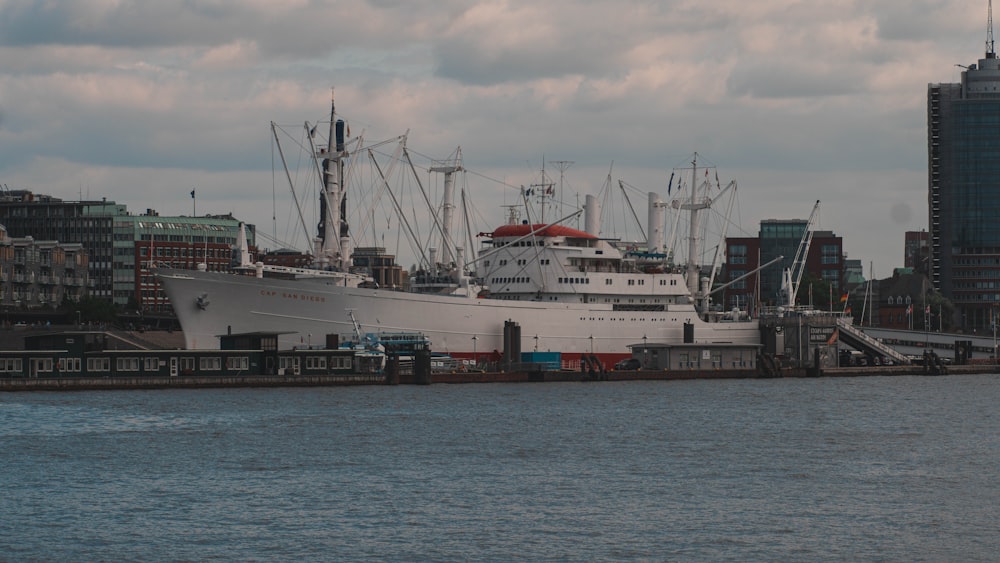 white and black ship on sea during daytime