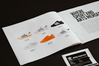 white printer paper on black surface