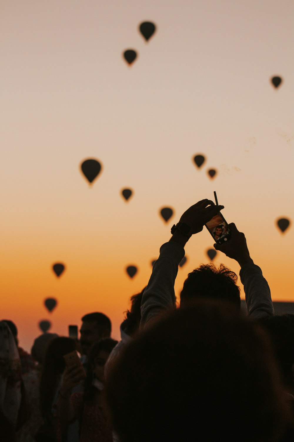 silhouette of people during sunset