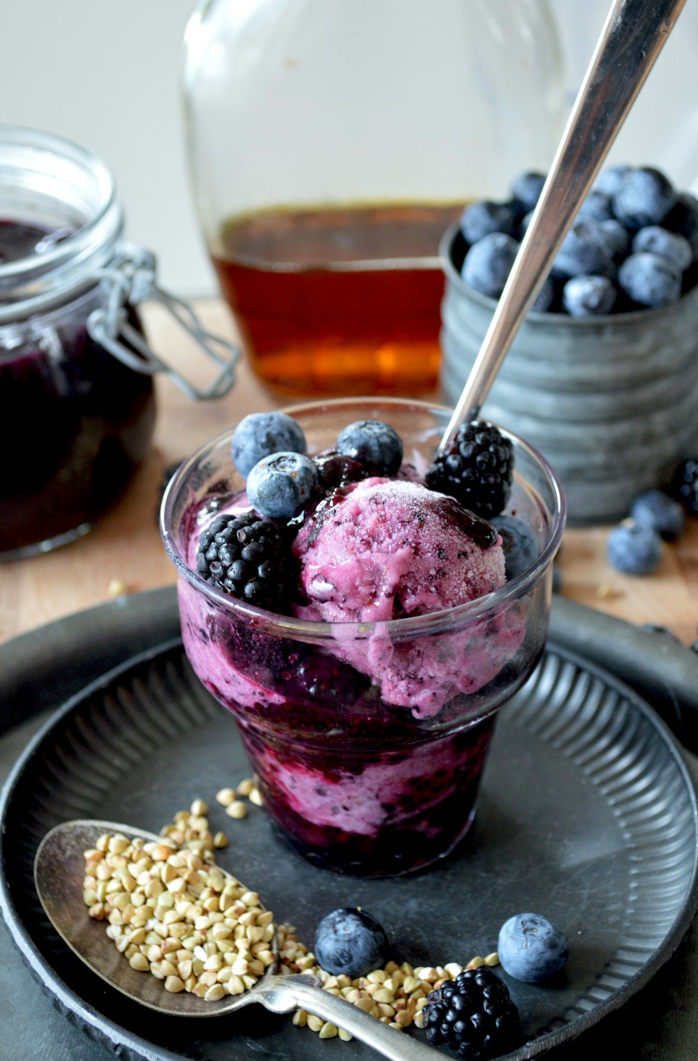 ice cream with cherry on clear glass cup