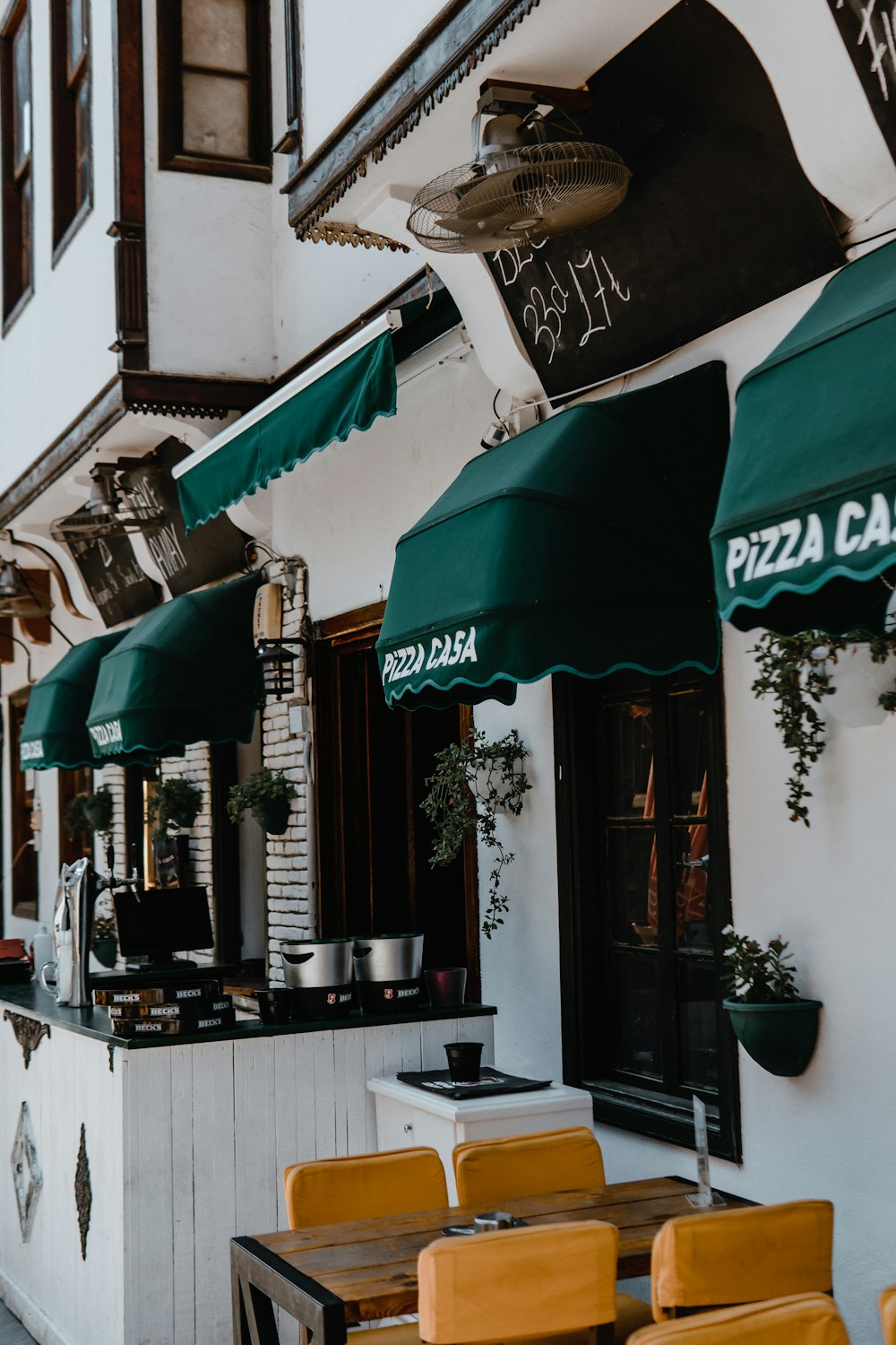 green and white patio umbrella