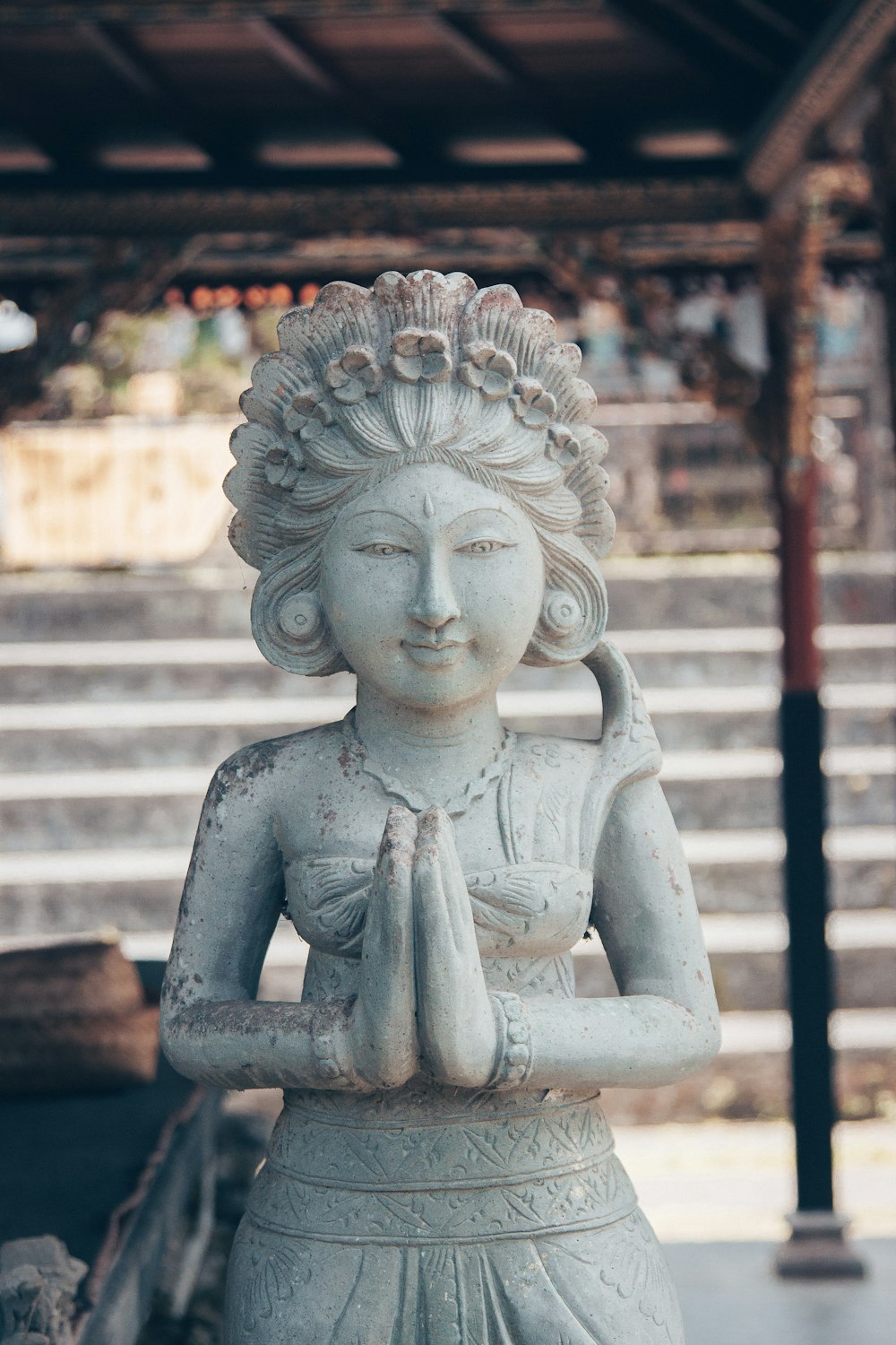 gray concrete statue of a woman