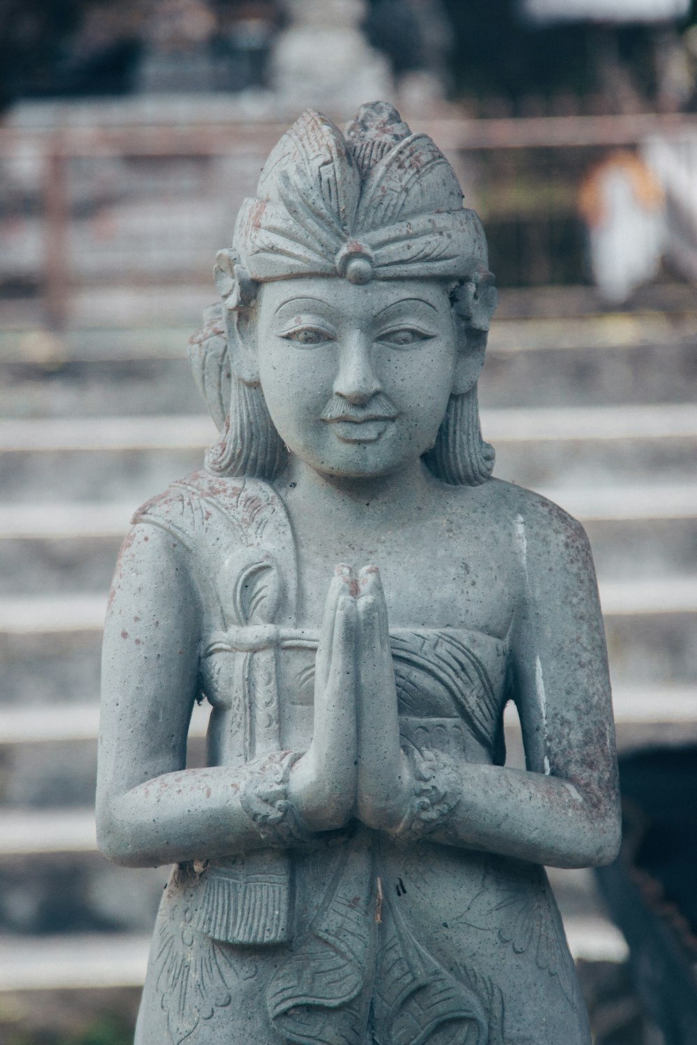 gray concrete statue of a woman