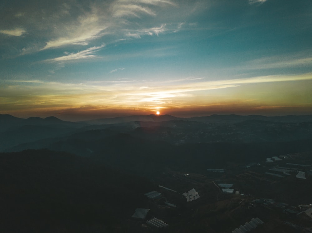 silhouette of mountains during sunset