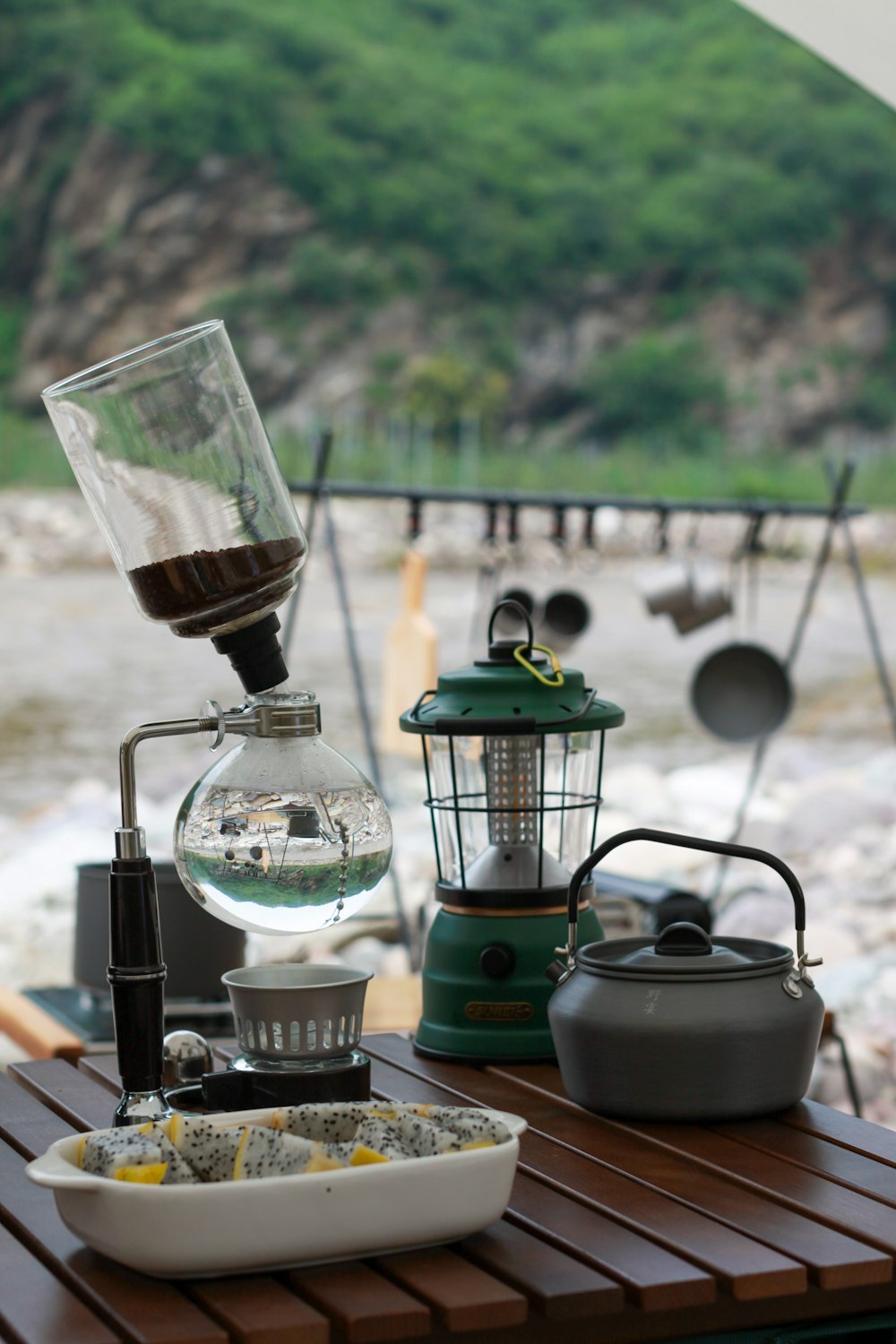 black and silver lamp on brown wooden table