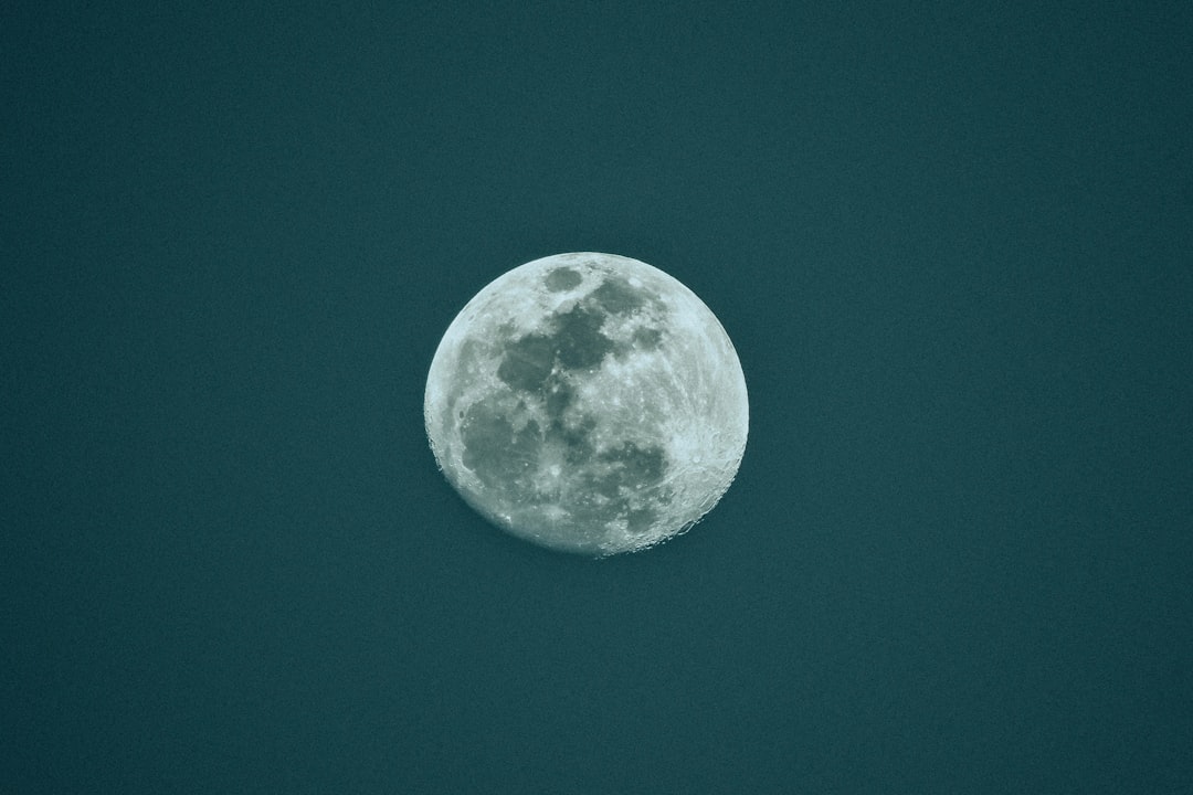 full moon on blue sky