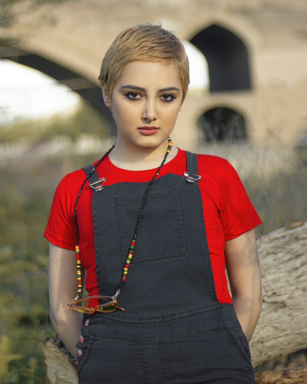 girl in red and black crew neck t-shirt and black skirt