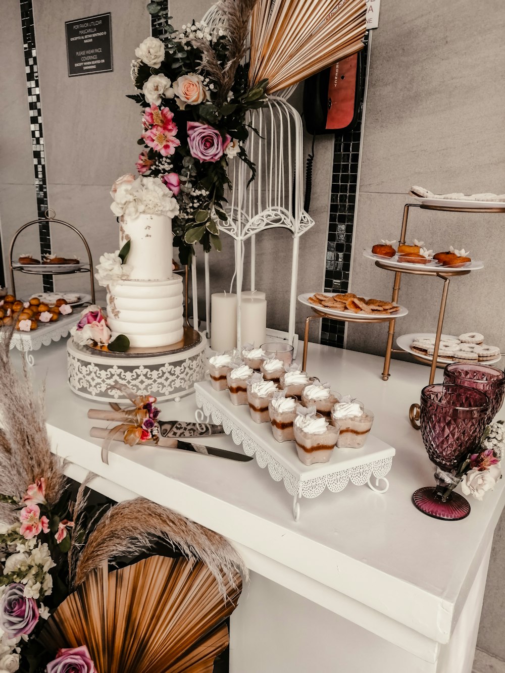 white and pink cake on white table