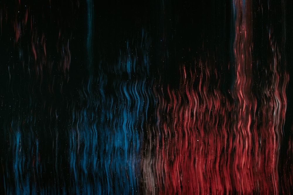 pintura abstracta roja, azul y negra