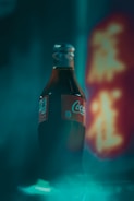 coca cola bottle on table
