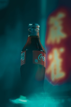 coca cola bottle on table
