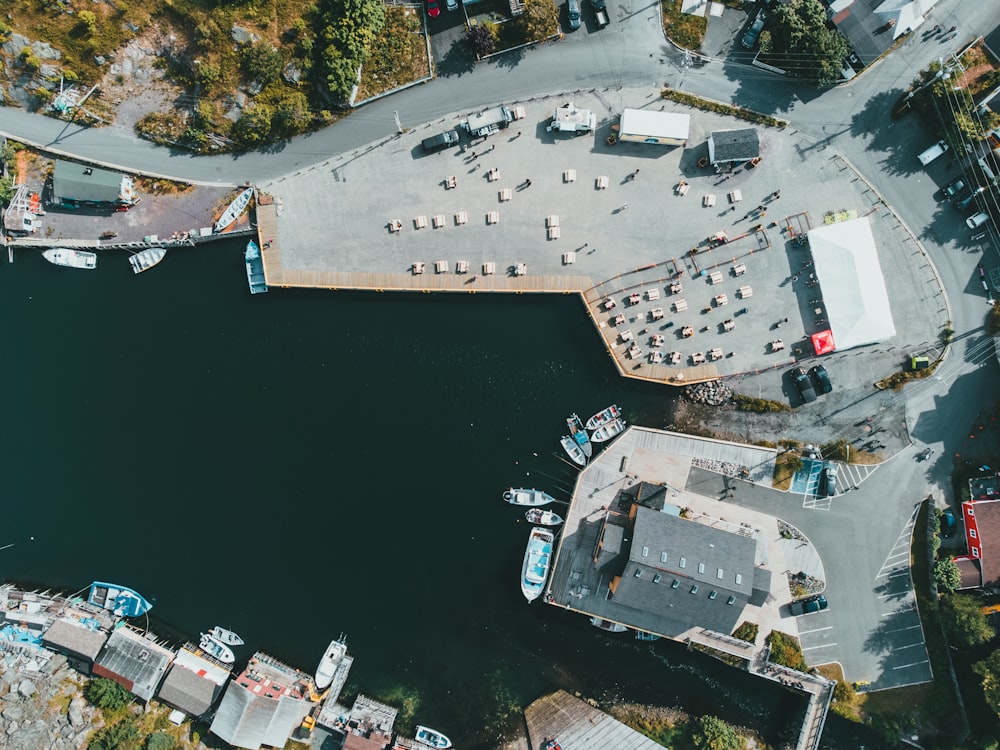 aerial view of white and gray boat on body of water during daytime