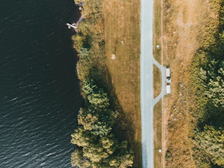 A scenic view of Water Mill Airport with a Millhaven car waiting nearby.