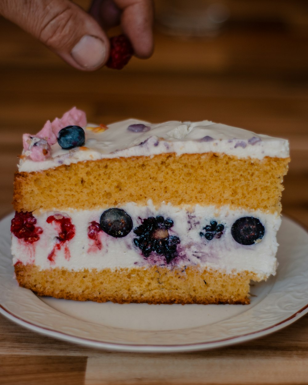 white and yellow cake on white ceramic plate