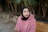 woman in purple hijab and pink sweater