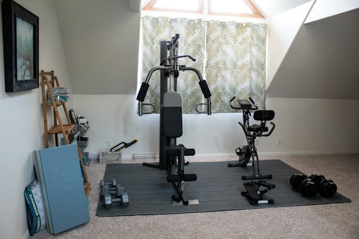Home gym equipment in a converted garage