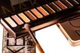 Artistic capture of a nude-toned eyeshadow palette with subtle shimmer.