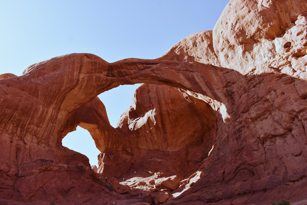 brown rock formation under blue sky during daytime