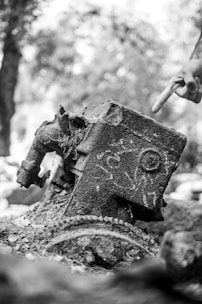 Close-up of hands pointing at a property damage photo during a case analysis meeting.