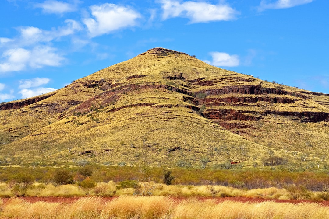brown mountain under blue sky during daytime