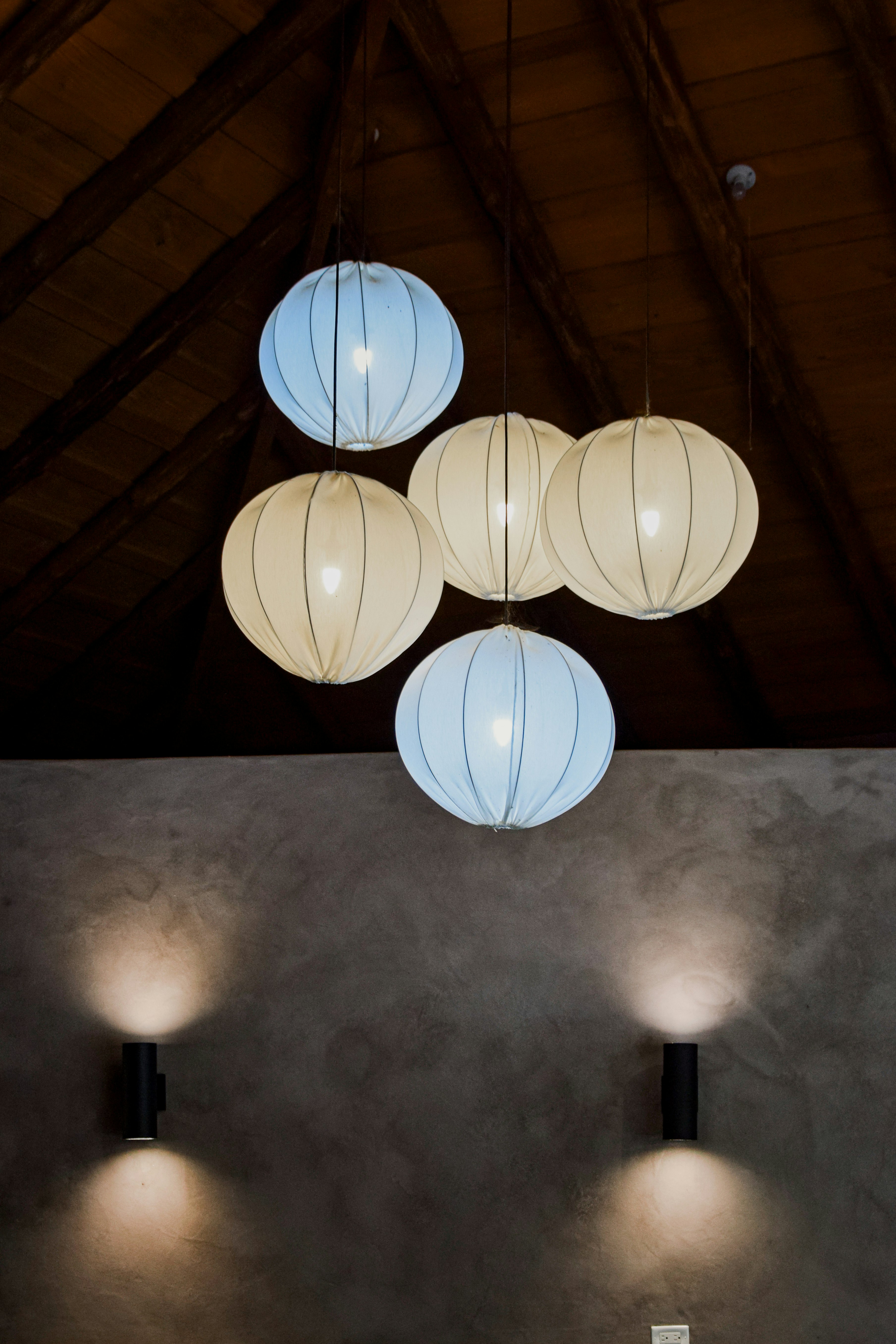 white paper lanterns on brown wooden floor