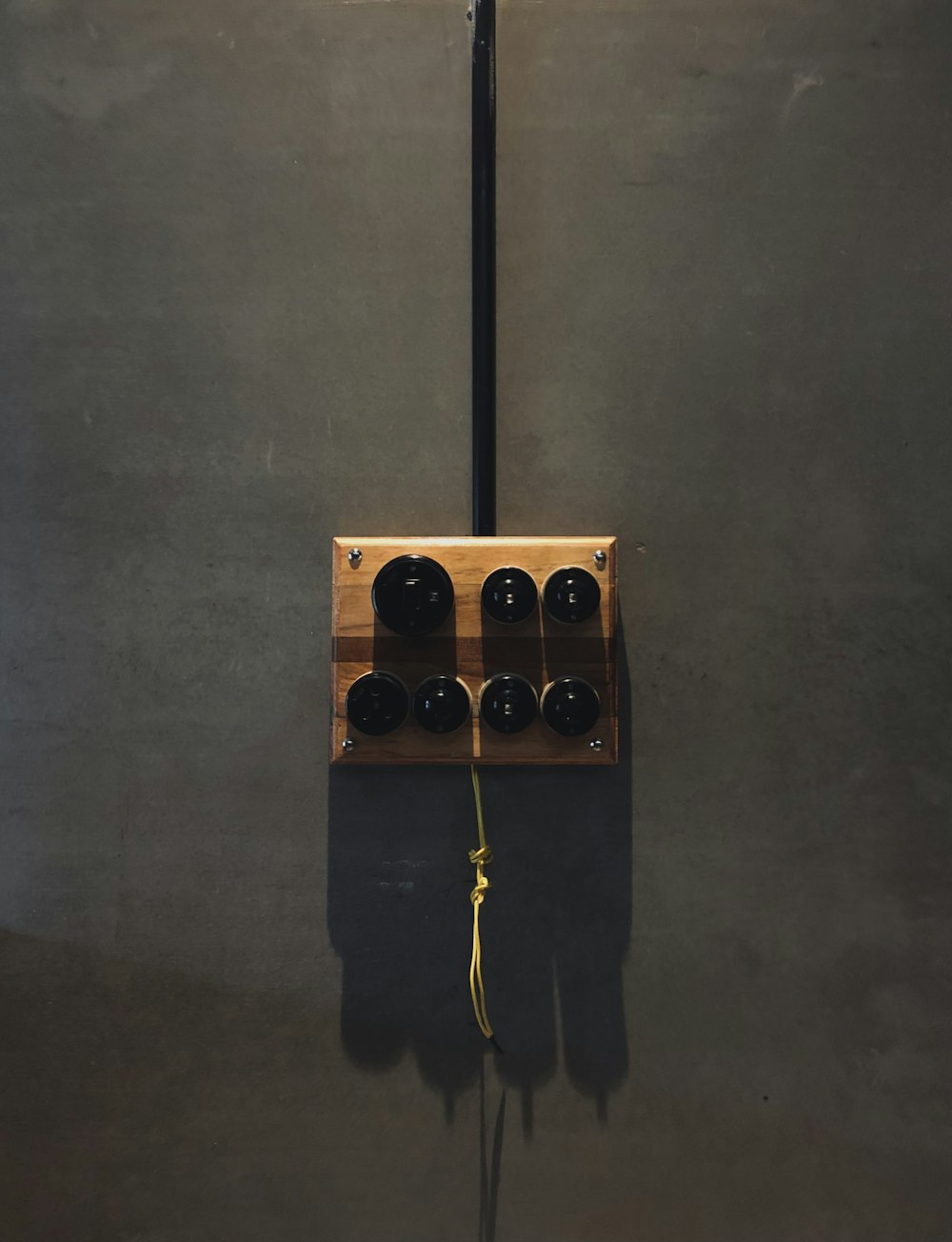 black and brown speaker on black stand