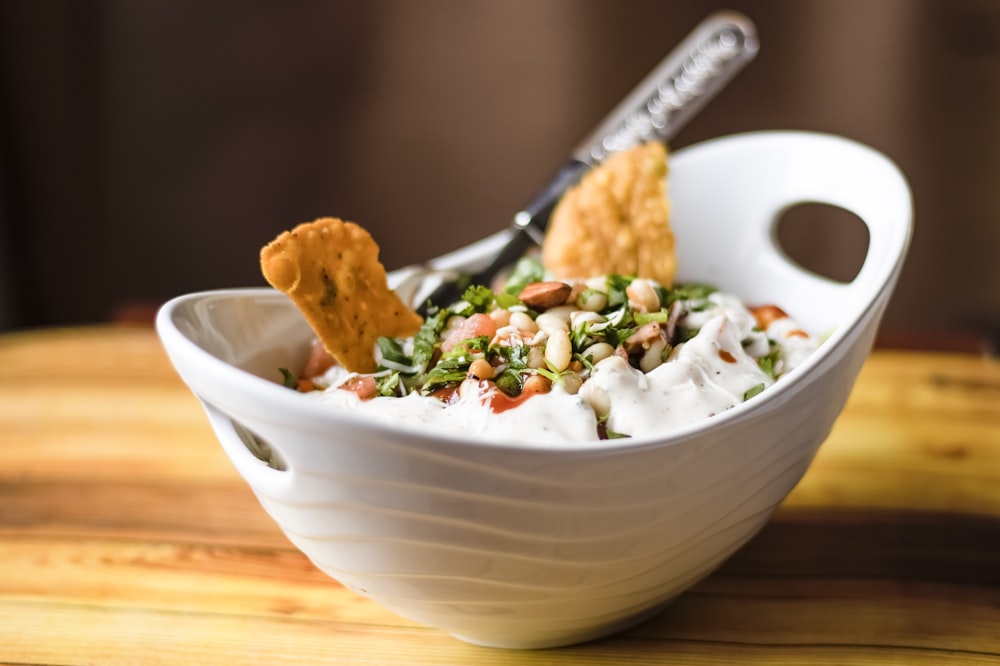 white ceramic bowl with food