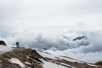 A serene mountain landscape in Georgia with hikers enjoying the view.