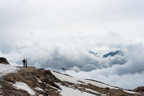 A serene mountain landscape in Georgia with hikers enjoying the view.