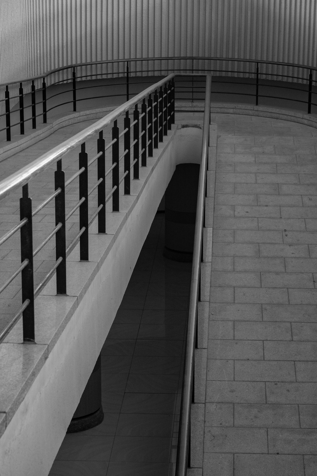 grayscale photo of concrete staircase