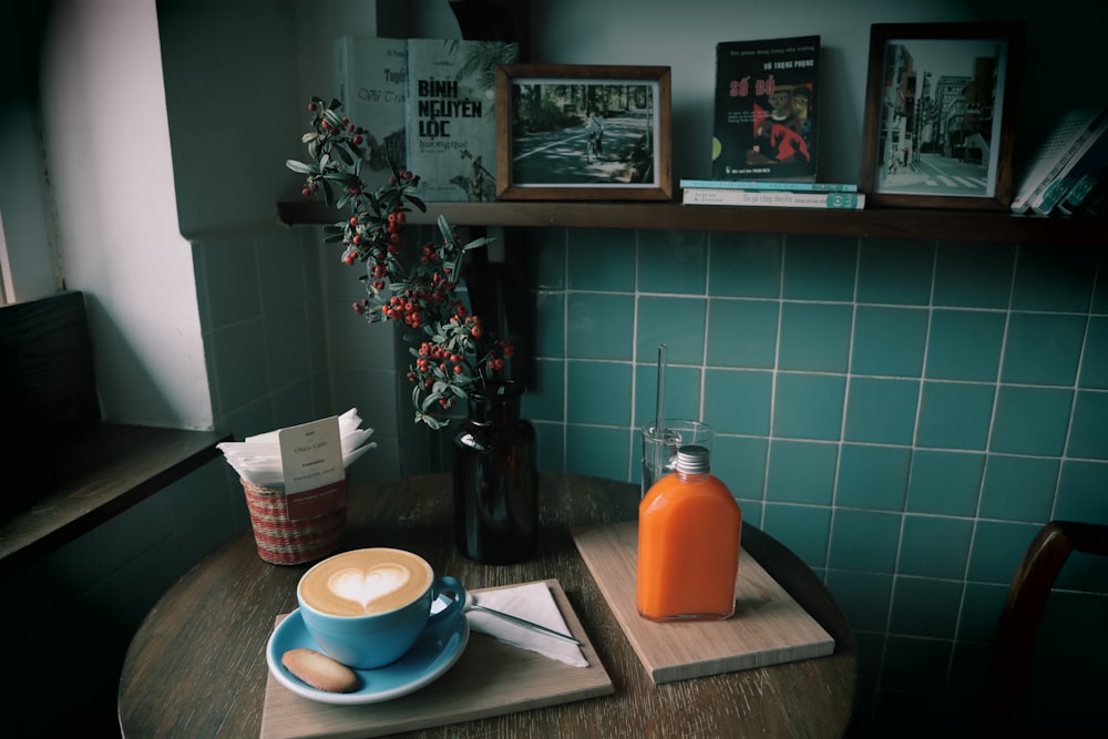 orange plastic bottle on brown wooden table