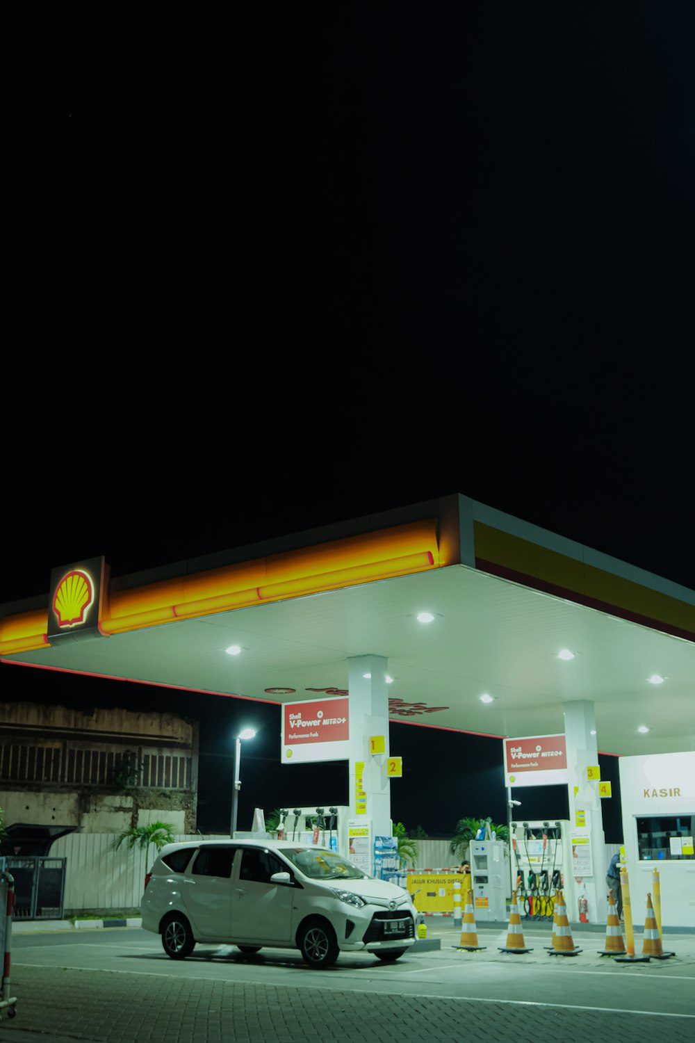 white and yellow concrete building during nighttime