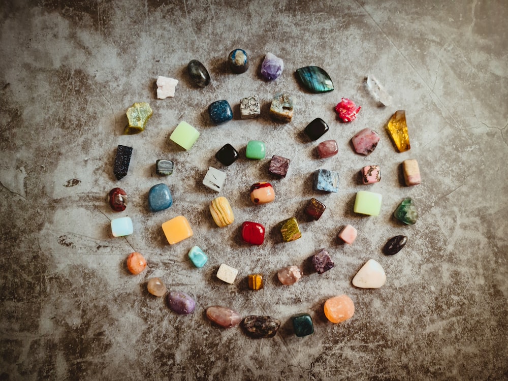 assorted color stone on gray concrete floor