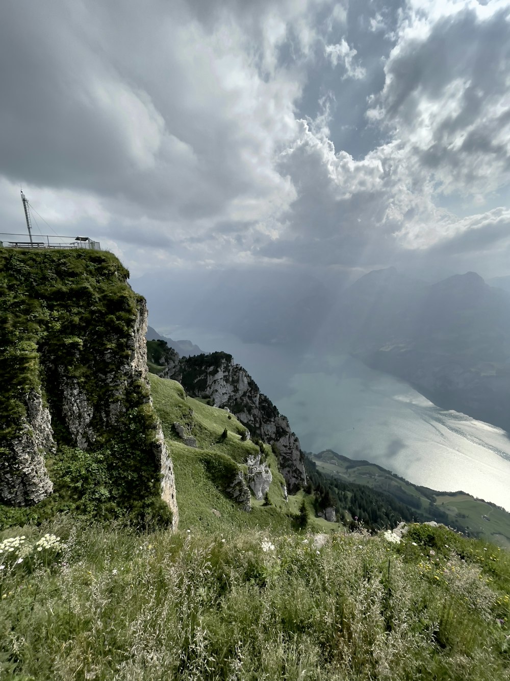 green and brown mountain under white clouds during daytime