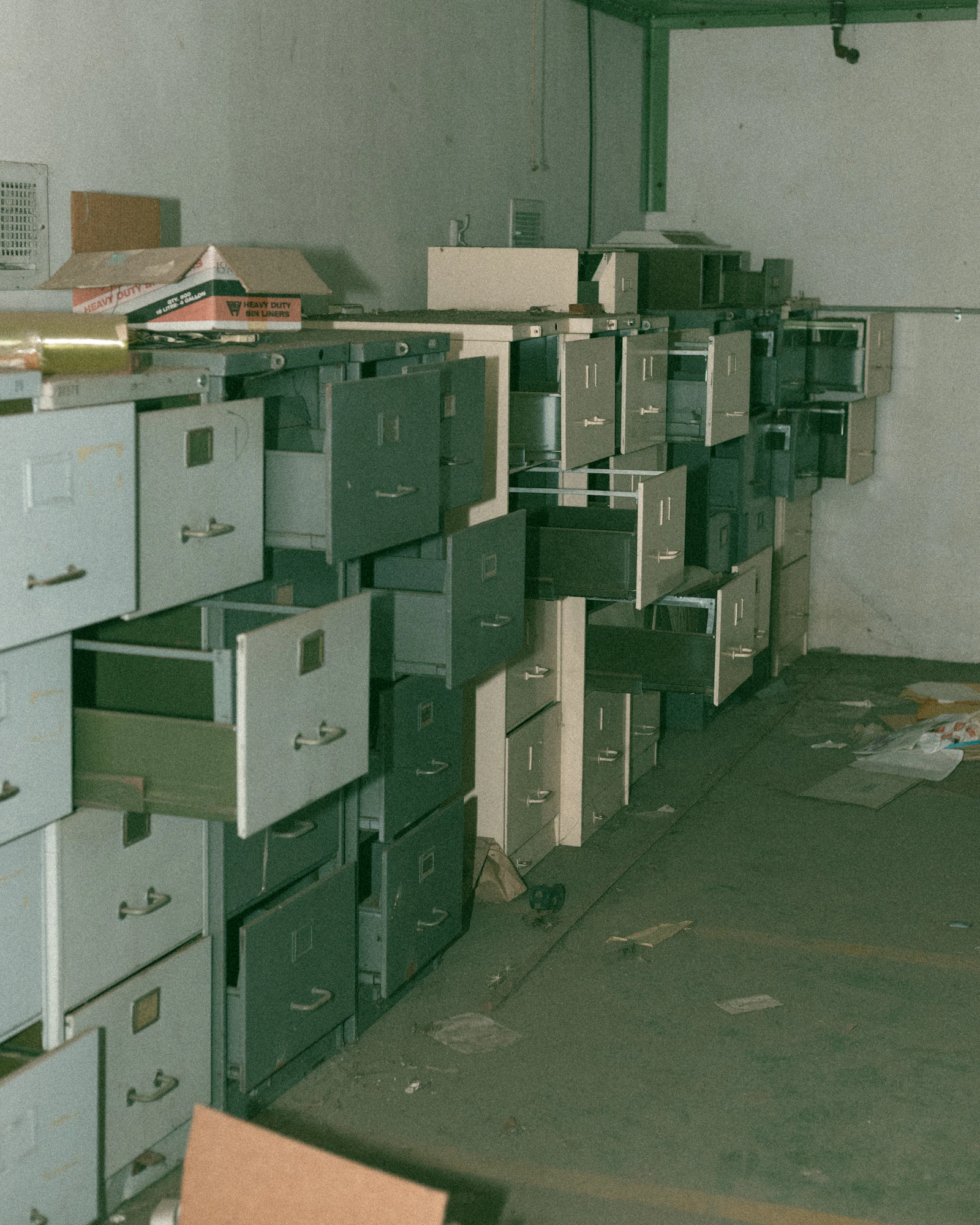 Green and white cardboard boxes
