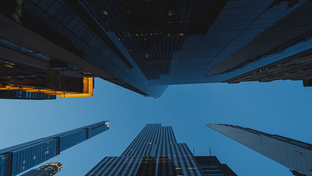 low angle photography of high rise buildings