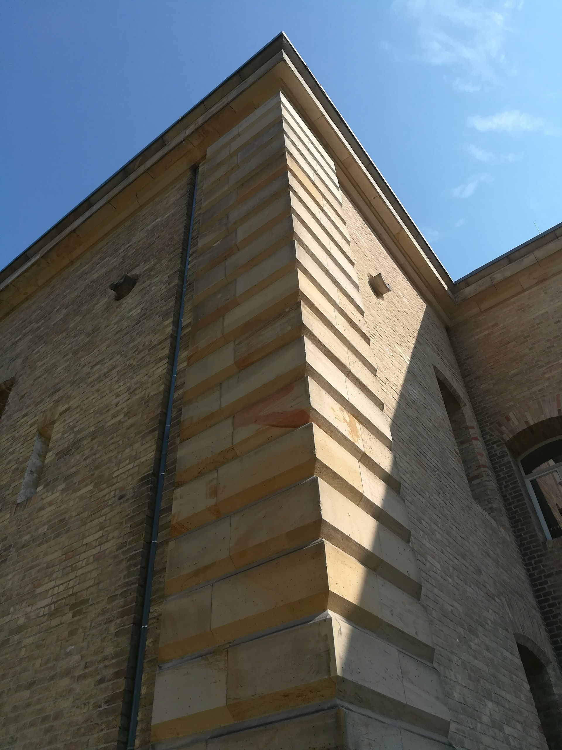 black and brown leather padded tub sofa