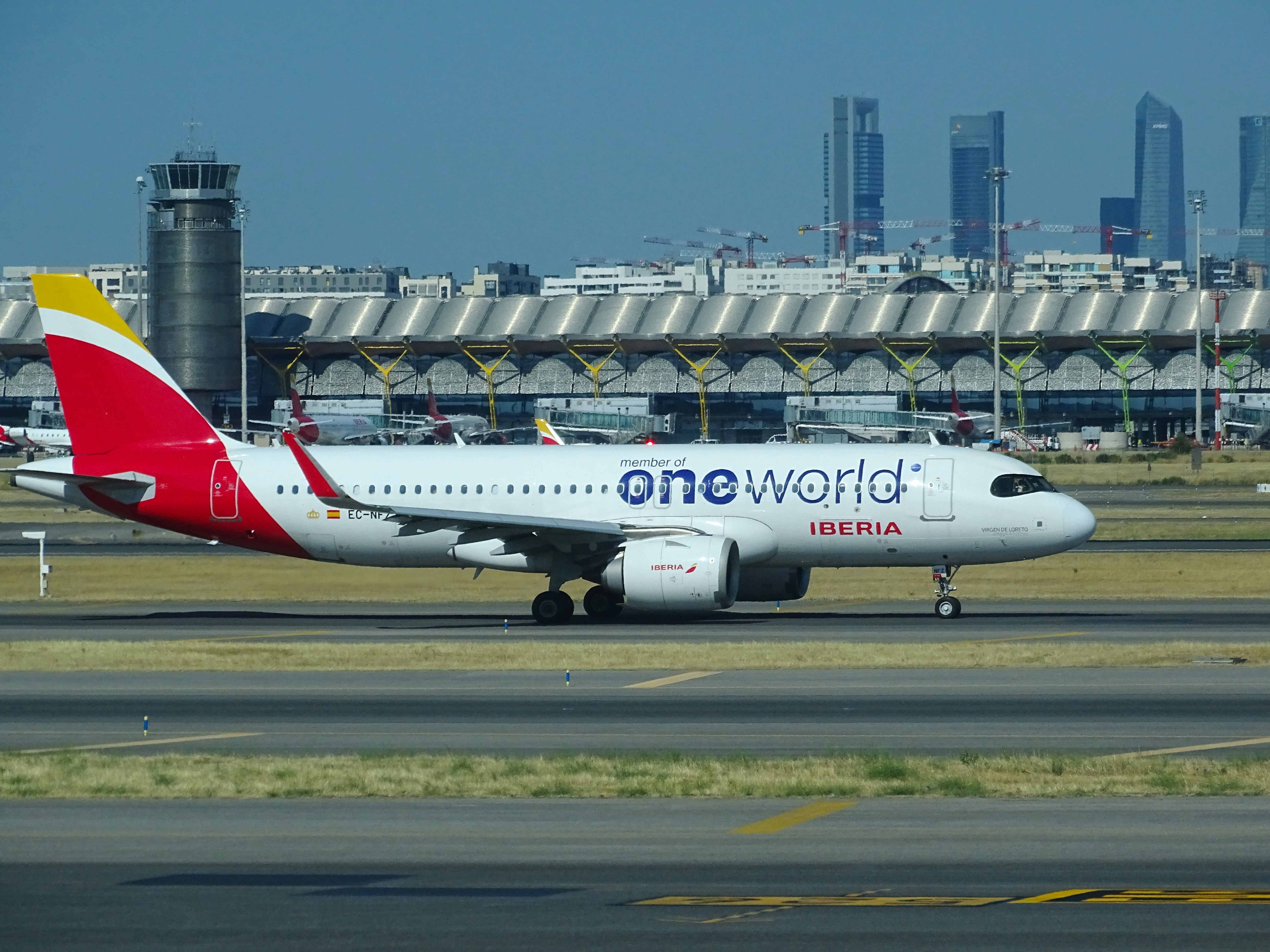 white and red passenger plane on airport during daytime, Iberia A320NEO