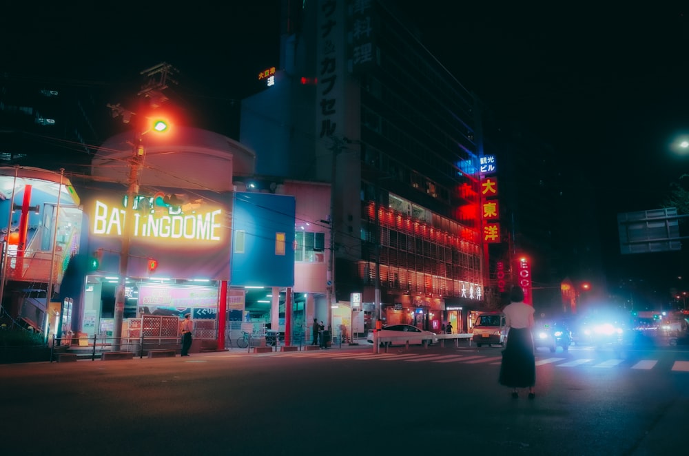 cars parked in front of building during night time