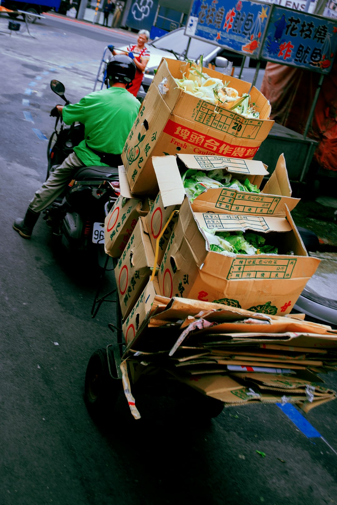 brown cardboard boxes on black motorcycle