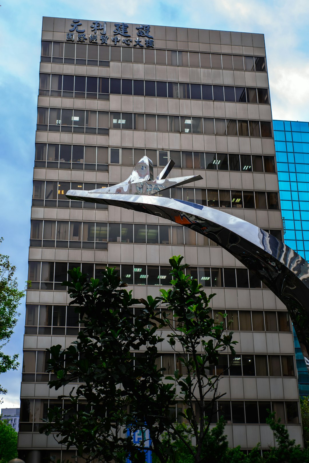 white and black bird statue