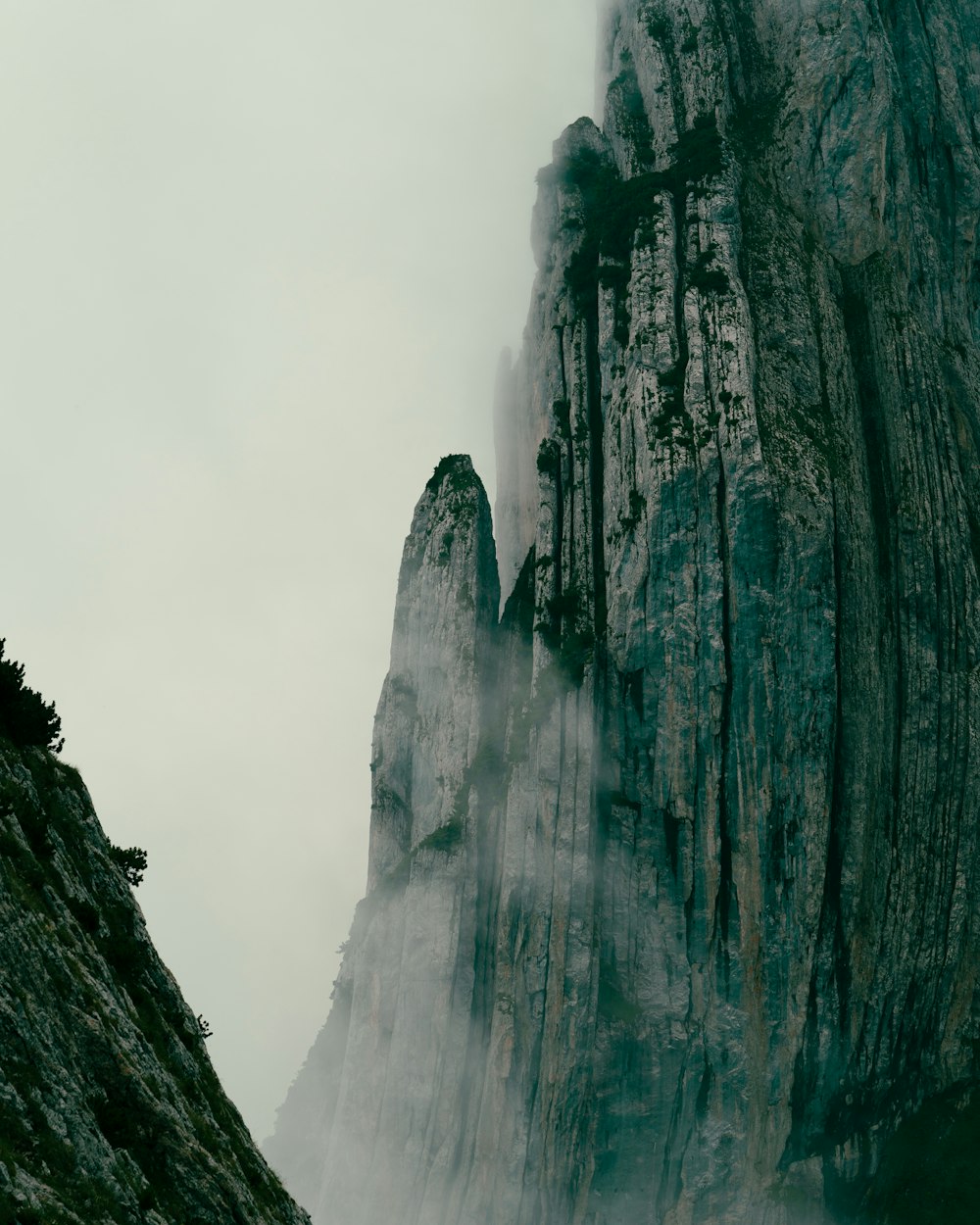 green and brown rock formation