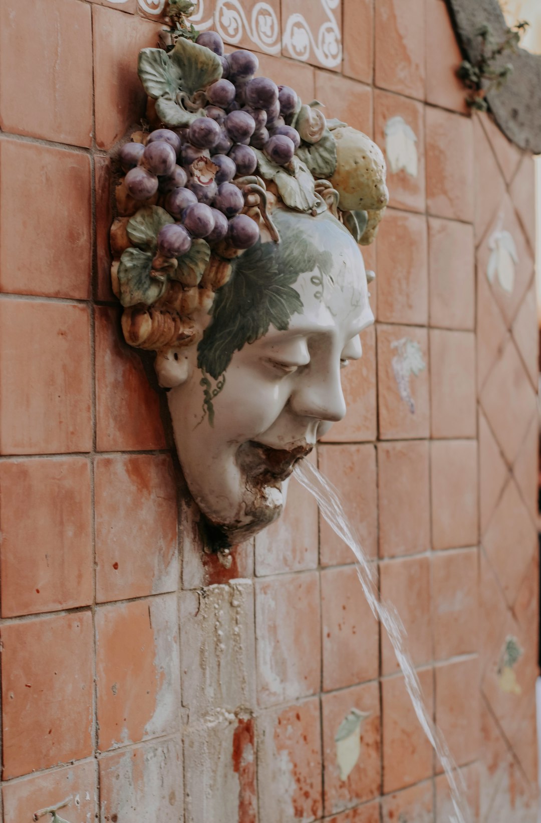 white ceramic head bust with brown and white flowers