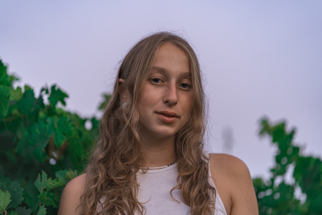 woman in white tank top