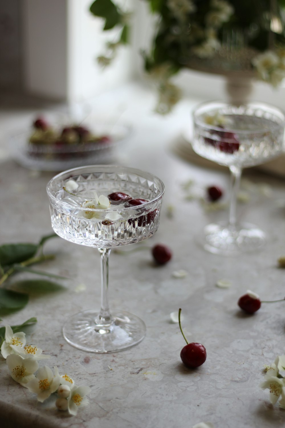 clear glass bowl with red and white liquid