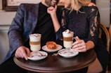 Couples enjoying a cozy coffee chat during a community event