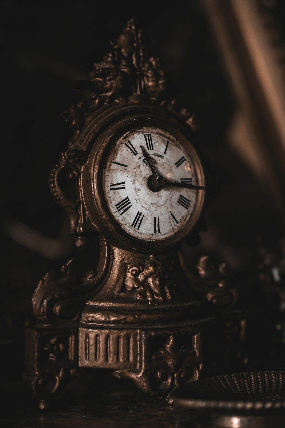 black wooden analog clock at 10 00